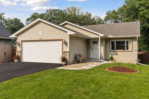 11380 West River Road, 2 Bedrooms, 2 bathrooms, 1400 Finished Square Feet, a 2 Car attached Garage, and a fully fenced-in Back yard.