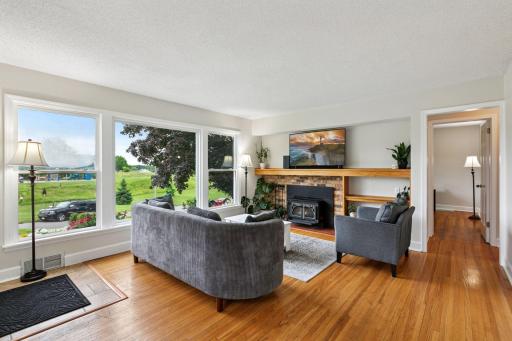 Main floor living room with so much natural light