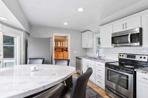 S/S appliances and beautiful tile backsplash