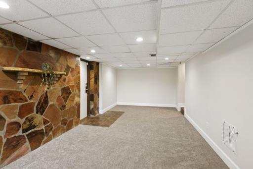 Super fun stone wall in the lower level family room