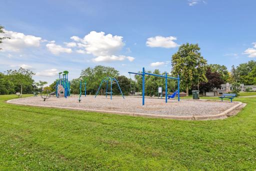 Full playground with so much green space to play