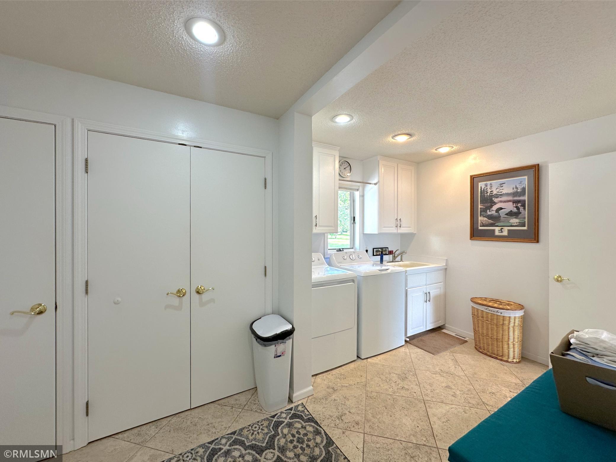 Durable tile flooring and a clean, practical & open layout make this a highly efficient space for busy households.