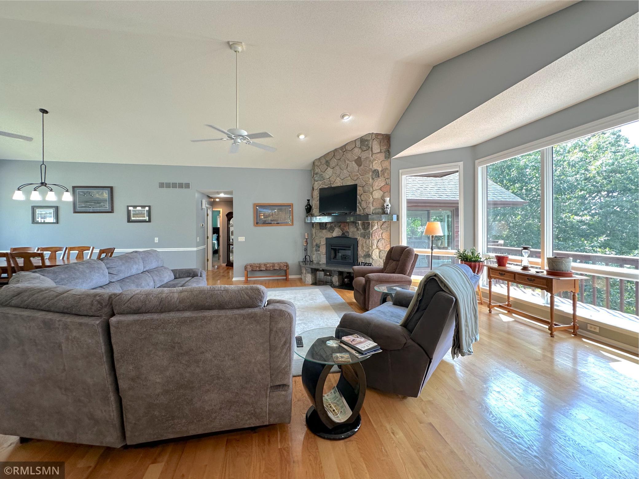 Perfectly positioned in the heart of the home, glass doors invite you to step outside and enjoy the lakeside views.