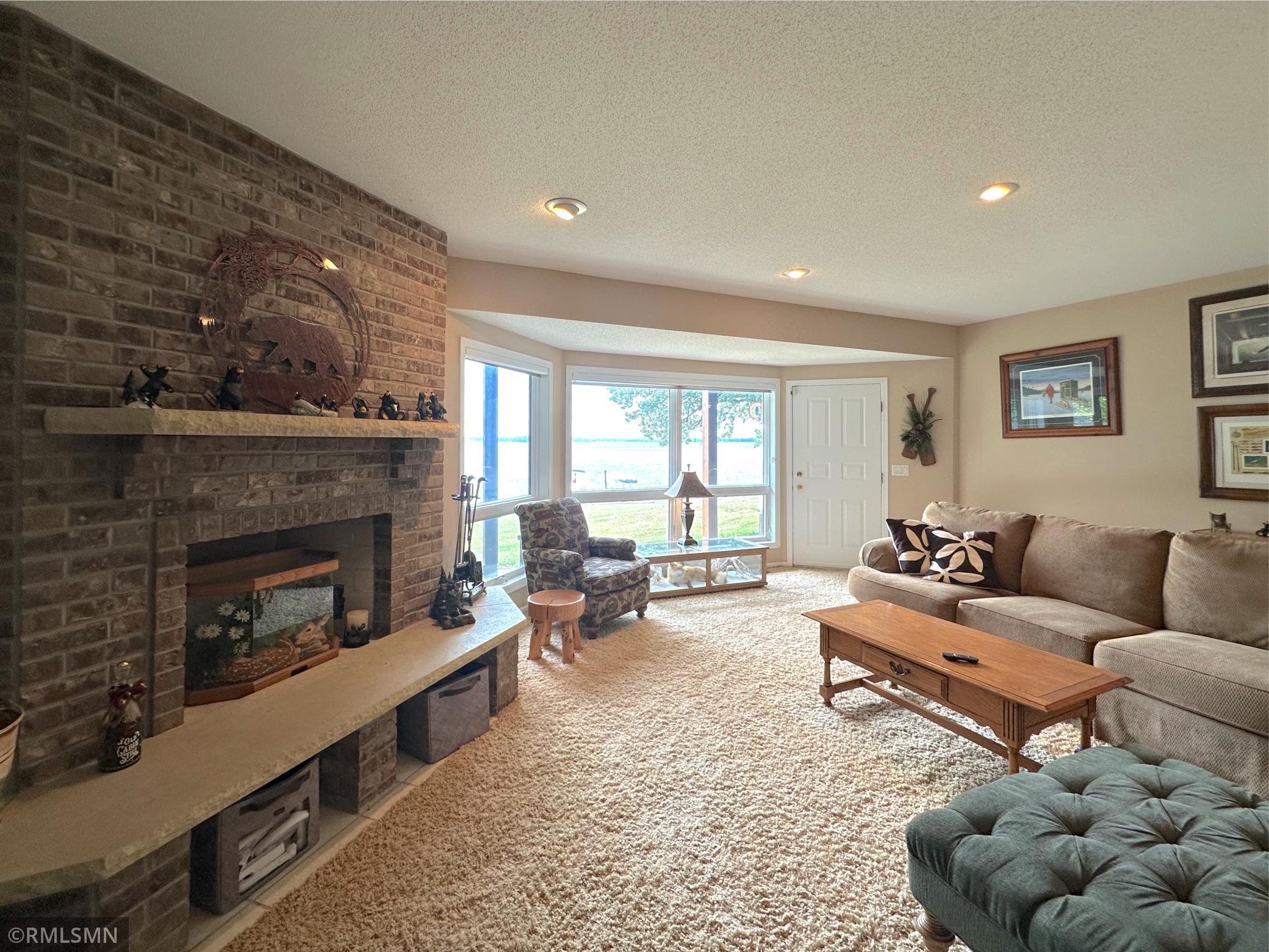 With direct walk-out access to the backyard and lake, this room perfectly blends comfort and scenic beauty.