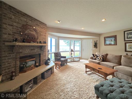 With direct walk-out access to the backyard and lake, this room perfectly blends comfort and scenic beauty.