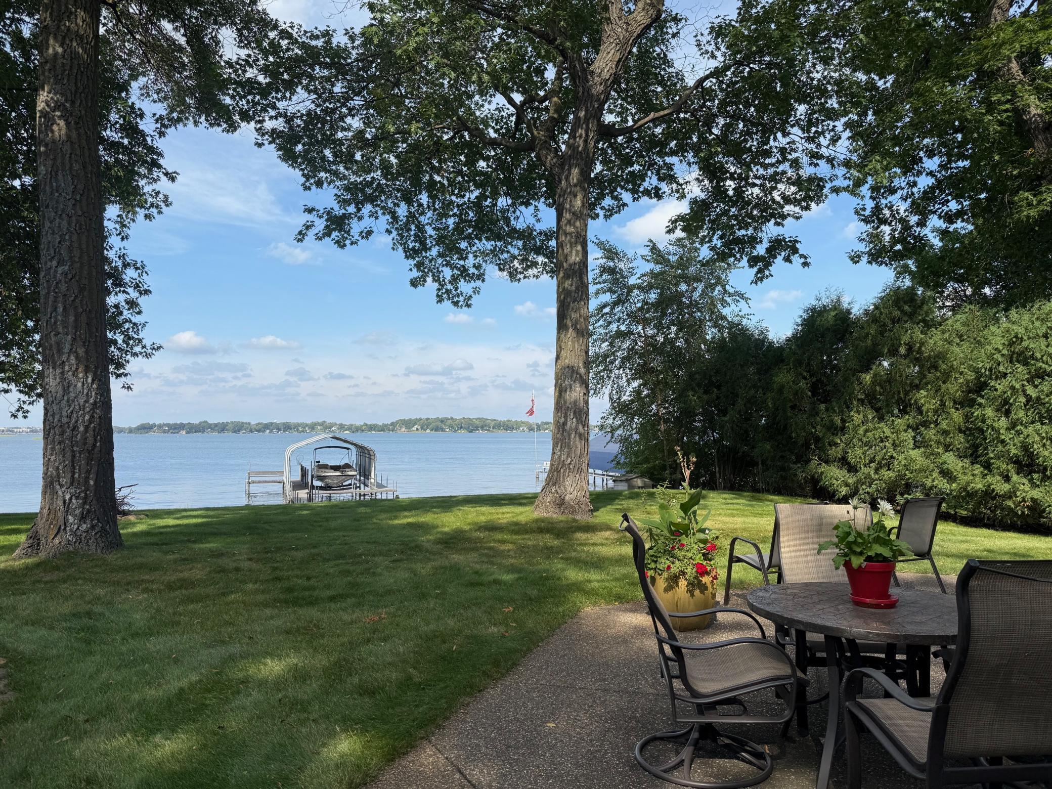 Imagine coming home to this spectacular lake view and privacy! There is a large patio for relaxing, entertaining and grilling.