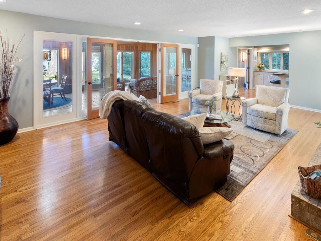 Living Room has original hardwood flooring in like-new condition.