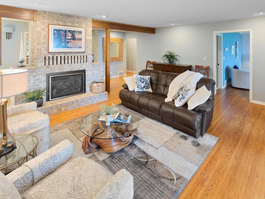 Living Room has a warm, cozy brick gas fireplace for those cool evenings and snowy days.
