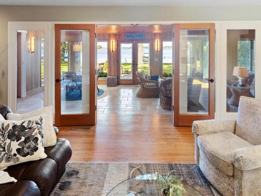 Beautiful glass doors open to Great Room with spectacular views of lake!