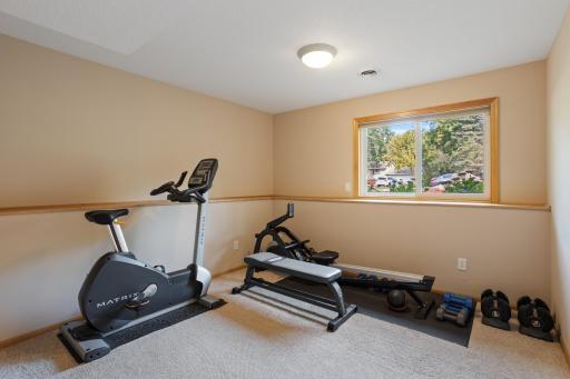 Fourth bedroom has a lookout window and is currently used as an exercise room.