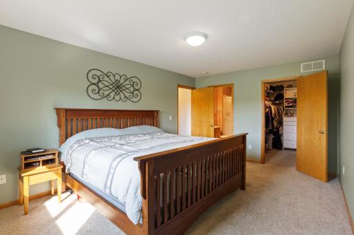 Primary bedroom suite has a large, walk-in closet plus a 3/4 bathroom.