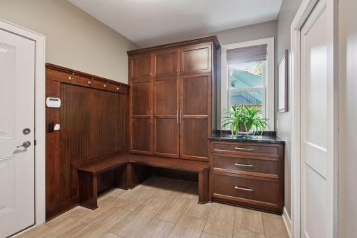 Mudd room with built in lockers and drop station.