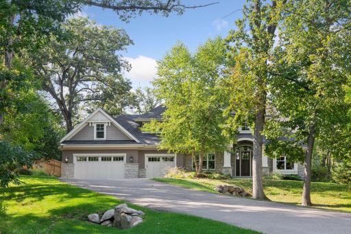 Welcome home to 2462 Meeting Street! This stunning custom built Wooddale home is situated on a beautiful .90 acre wooded lot.