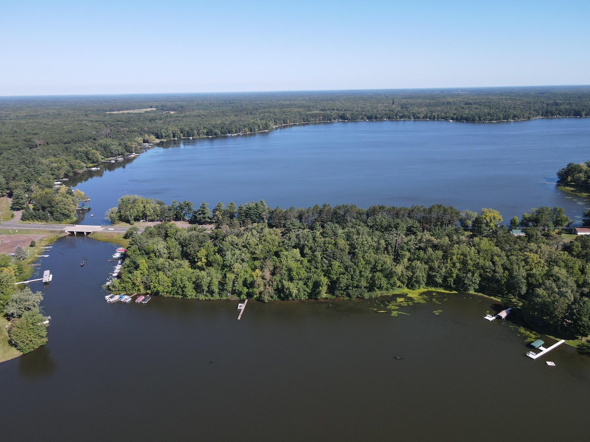 Located next to channel connecting Clam Lake to Lower Clam Lake