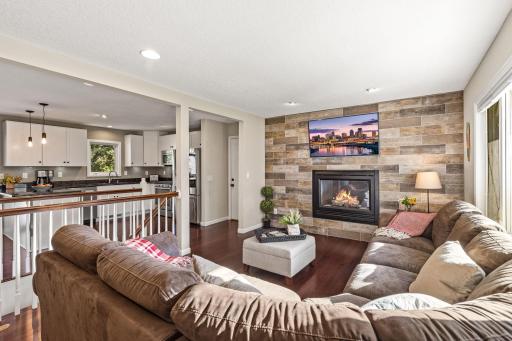 Bright and airy living room with gas fireplace