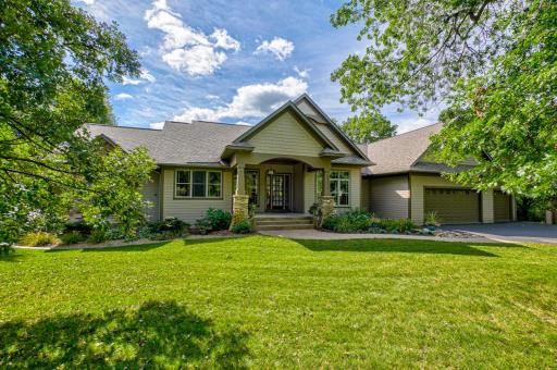 Expansive living meets timeless craftsmanship in this 4 bed, 4 bath retreat set on over 2 acres of privacy and natural beauty. Ideally located near Badlands Golf Course and just a short drive to Hudson and I-94.