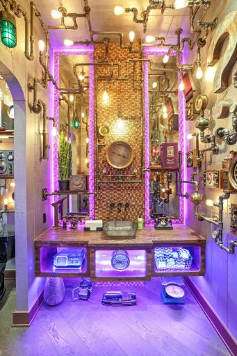 Every fixture feels hand-forged, every gadget mid-invention, as if the room itself is still happily tinkering.