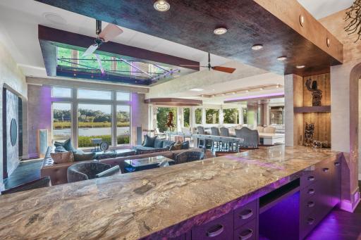 Complete with DJ table, Miele Dishwasher, icemaker, and Sub-Zero fridge, guests are in for the time of their lives.