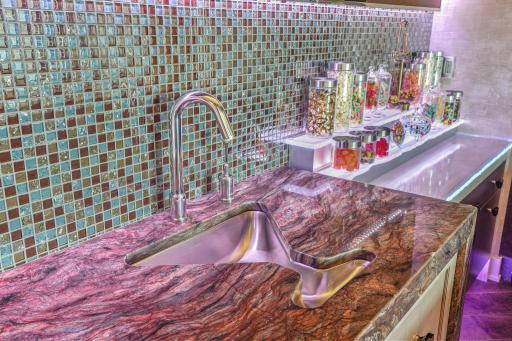 While a martini-shaped sink insists cocktails (and candy!) deserve a sense of humor.