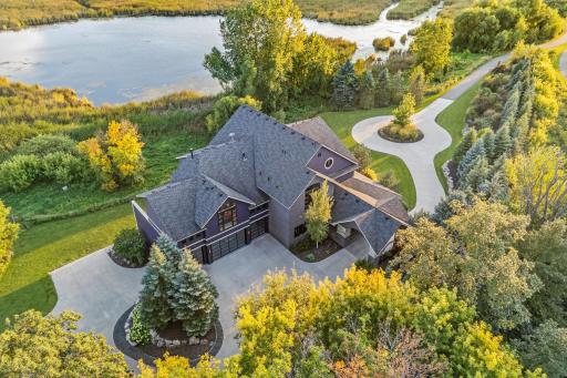 Thirty-six acres of pond, meadow, and forest cradle the house like a private nature preserve. Nine acres of high ground offer space for play and creation, while mature trees stand as guardians of privacy.