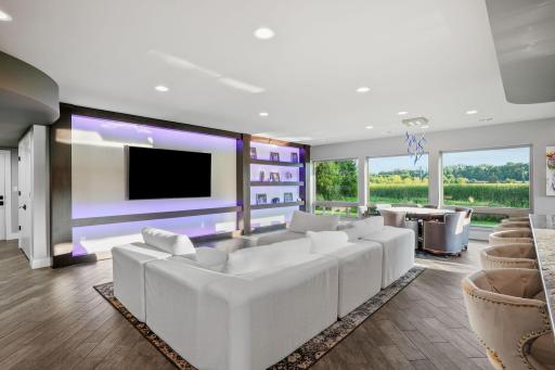 This fully ADA-compliant lower level includes a separate kitchen, additional bedrooms, and private garage and entry ideal for multi-generational living.