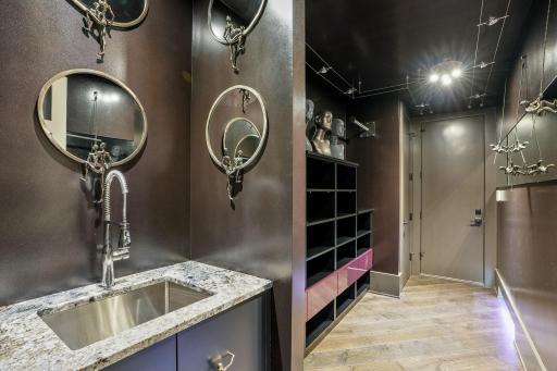 The mudroom off the garage doesn't fail to deliver on whimsey, even in it's practical function.