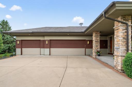 Very large finished in floor heated three car garage area with daylight windows.