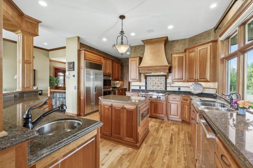 Prep sink, built in drawer microwave, Sub-zero refrigerator, Wolf double oven and cooktop.