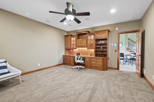 Lower level office flex room can be whatever you need it to be with window and built-in office work area.