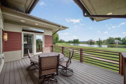 Main floor deck with 18 green, fairway and water views!