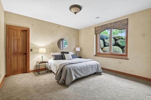 Lower level bedroom with spacious walk in closet