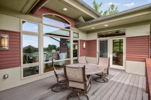 Step out from the sun-room to this private maintenance free deck with sprawling views.