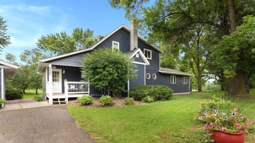 Welcome Home! Charming 4 bedroom home on Hole #6 and the driving range of the golf course!