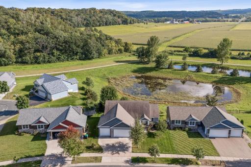 Enjoy a private backyard with a pond, and view of the rolling valley.