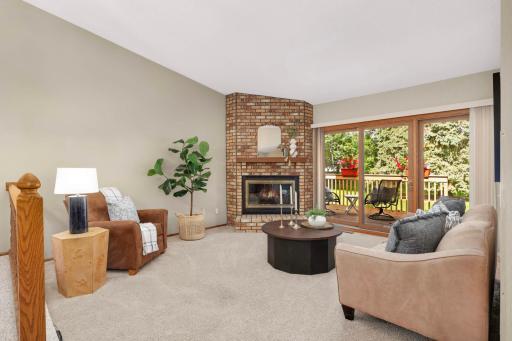 Large windows bring in natural light, making this the perfect space to relax or entertain