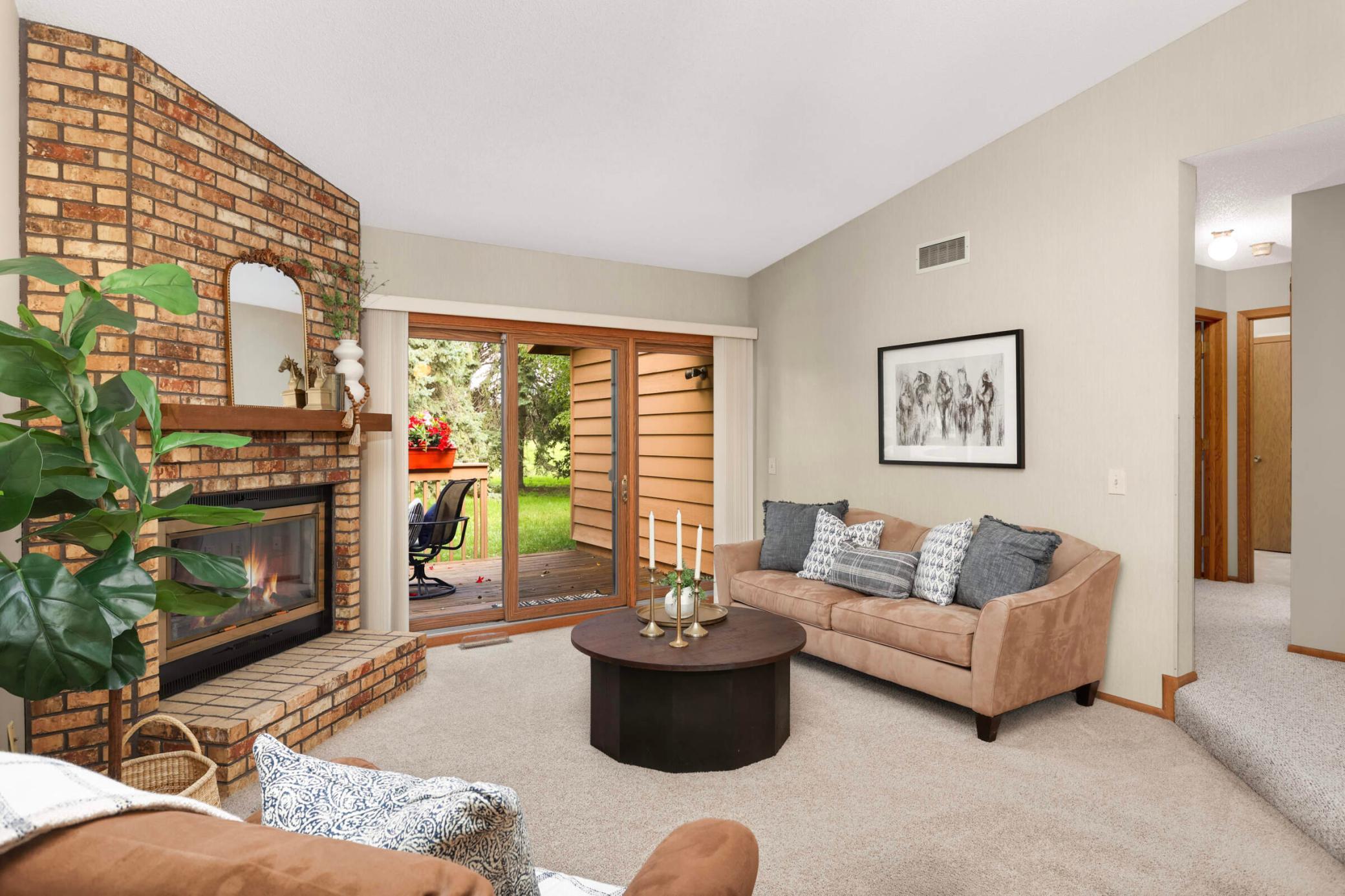 A sliding glass door leads to your private patio area—perfect for morning coffee, evening relaxation, or a small container garden