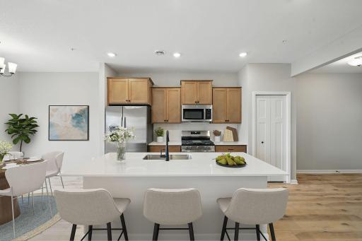 Open concept - kitchen is virtually staged but similar finishes.