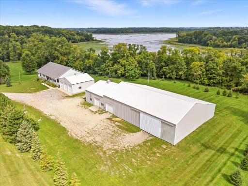 The outbuilding has an 80 x 50 barn, a 40 x 32 shop/garage and a 80 x 16 lean to. WOW!
