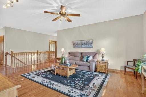 The railings are solid oak, and so are the stair treads, on the extra-wide staircase.