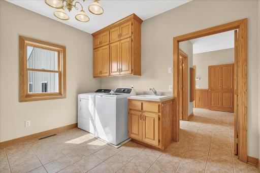 This laundry room is fully loaded, and you can even close all the doors, to close off the whole room. The laundry machines are included too!