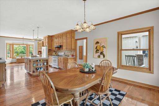 The formal dining space, the kitchen AND the informal dining space being connected the way they are makes entertaining here not only easy, but joyful!