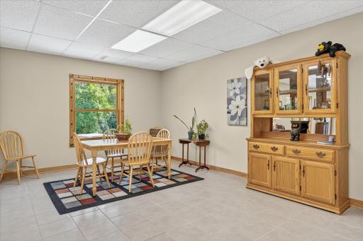 The rec room has plenty of space for a dining space, or a pool table, or table tennis, or a poker table, or a craft space. When you own this place, it will be totally up to you!