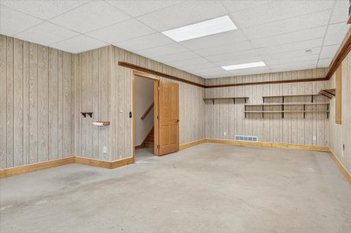 The built-in shelving stays. The owners used this space as a hobby room. Imagine what you could display on all those shelves.