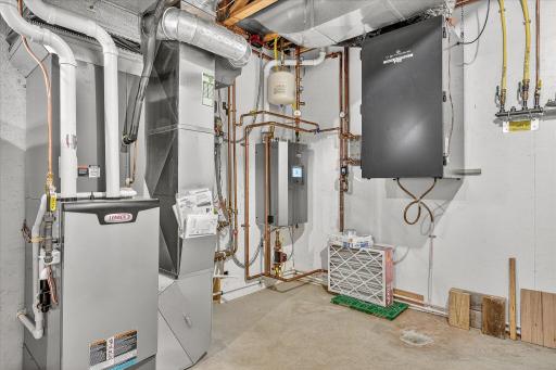 The boiler back in the corner is for the multiple-zone, Wirsbo in-floor heating.