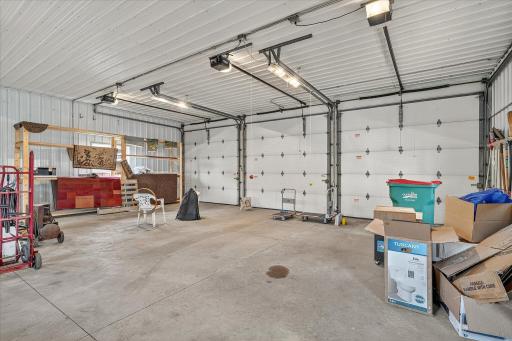 This heated garage features three 10 x 10 doors. Two of them have almost new LiftMaster MyQ openers.