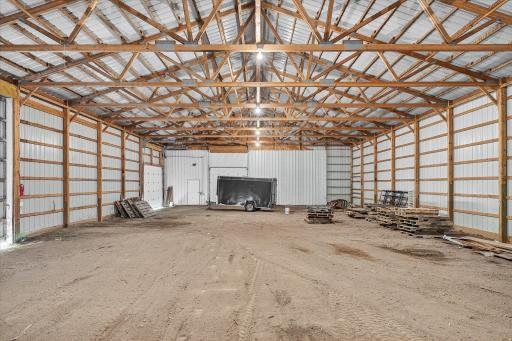 This space has 5 overhead lights, two 10 x 10 overhead doors and a 20w x 15h sliding door.