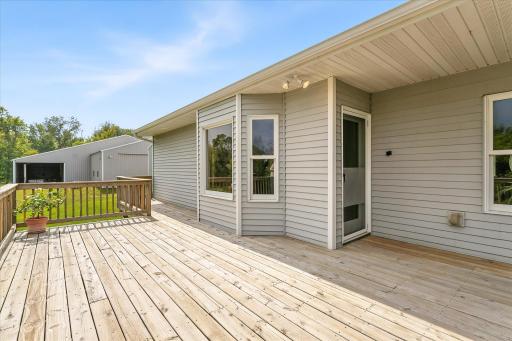 Just like the patio, the deck also spans from one end of the home to the other.