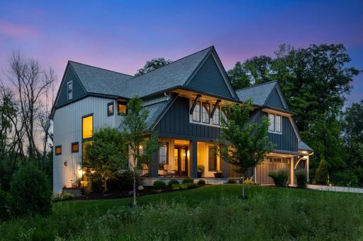 Prepare to be captivated by this flawlessly designed Hartman Homes masterpiece in the Woods of Medina! Covered front entry provides a grand and welcoming first impression