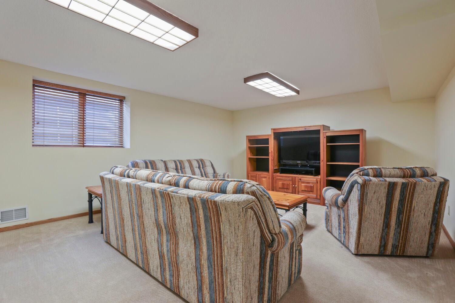 The lower level family room is perfect for entertaining!