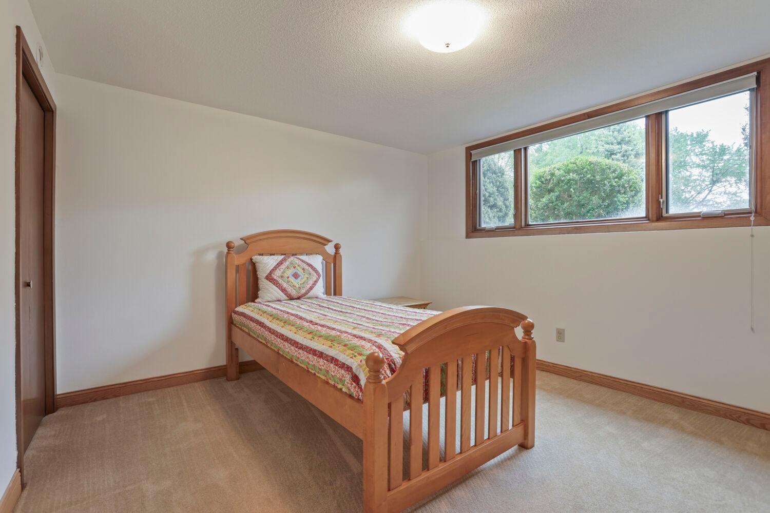 Look at the huge window in the lower level third bedroom!